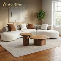 Canapé d'angle incurvé moderne sur mesure, durable, en tissu bouclé crème de luxe, rembourré en mousse, avec pieds en métal, pour villa