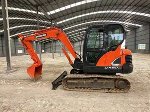 รถขุดตีนตะขาบ Doosan DX60-9C มือสอง ขนาด 5.7 ตัน รถขุดขนาดเล็กสำหรับงานก่อสร้าง ควบคุมด้วย PLC มอเตอร์ เกียร์ ปั๊ม แบริ่ง - Product Image 1