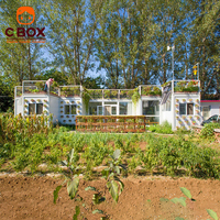 Cabane de jardin modulaire Cbox avec terrasse verte sur le toit, système solaire hors réseau, maison conteneur en kit
