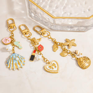 Llavero con Colgante de Concha Marina y Estrella de Mar, de Acero Inoxidable Chapado en Oro, Amuleto para Teléfono, Accesorio para Bolso con Temática Marina - Product Image 1