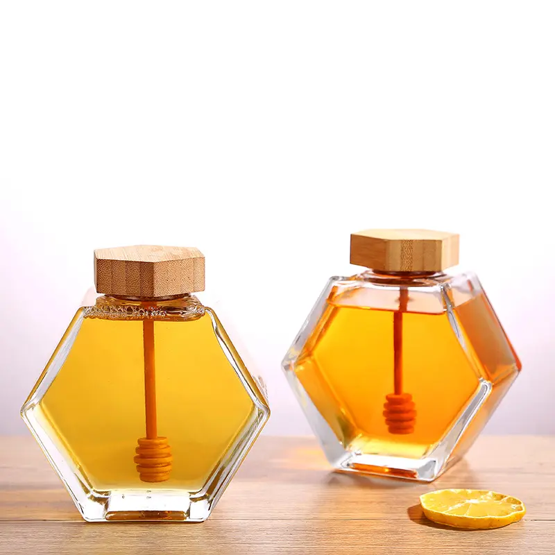 KDG Marca Cristalería Hexagon Flint Glass Honey Jar con tapa de bambú Stir 100mL 280ml 380Ml Frascos de vidrio para miel al por mayor