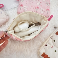 Vente en gros de sacs cosmétiques en coton matelassé floral mignon sac de rangement portable pour serviettes hygiéniques pour filles sac de maquillage doux dessin animé rouge à lèvres