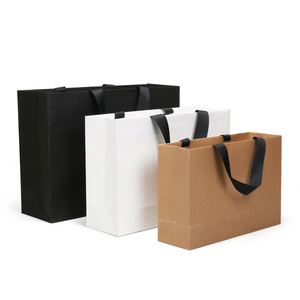 Bolsa <span class=keywords><strong>de</strong></span> <span class=keywords><strong>papel</strong></span> <span class=keywords><strong>Kraft</strong></span> reciclable personalizada con logotipo impreso personalizado, embalaje <span class=keywords><strong>de</strong></span> ropa, regalo, bolsa <span class=keywords><strong>de</strong></span> <span class=keywords><strong>papel</strong></span> con asa <span class=keywords><strong>de</strong></span> compras con logotipo - Product Image 2