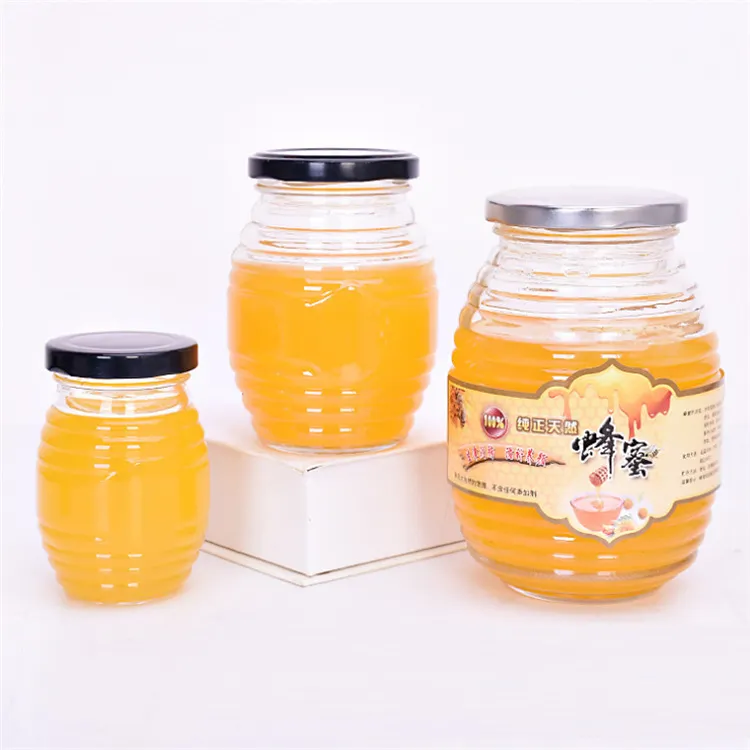 Frasco de vidrio transparente con forma de panal 100 mL 250 ml 500 ml 1000 ml frascos de vidrio vacíos recipientes de vidrio para miel con tapa de metal