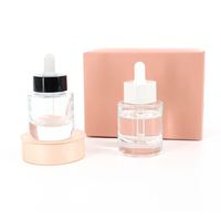 Bouteilles en verre à fond épais d'apparence délicate 30Ml 50Ml Essence de soins de la peau à épaule plate bouteilles cylindriques d'huile essentielle transparentes compte-gouttes