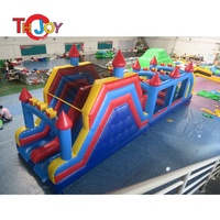 Jeu interactif gonflable extérieur de 12x3m, combos gonflables commerciaux de château plein d'entrain de glissière de videur de parcours d'obstacles à vendre