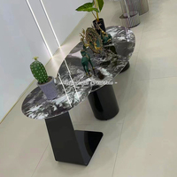 Table basse gigogne au design unique, luxe léger, avec plateau en pierre et pieds en acier inoxydable
