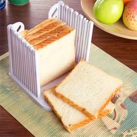 Trancheuse à pain en plastique réglable pour pain maison Outil de cuisson de cuisine pliable avec guide de coupe Bloc à découper