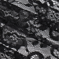 Dentelle de cils de luxe 100 % nylon cordonnée avec motif floral ajouré et bord festonné pour la conception élégante de robes de mariée