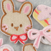 Borduurkledingaccessoires, borduurstickers, originele cartoon konijnen strik patches, zelfklevende patches, accessoires
