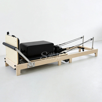 Fournisseur d'équipements de Pilates : Reformer pliable en bois d'érable, durable et portable pour usage domestique et studio de Pilates