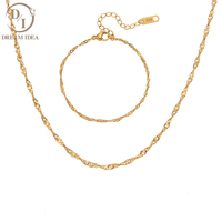 Nouvelle collection : Ensemble collier ras-du-cou et bracelet en acier inoxydable plaqué or, motif vague d'eau