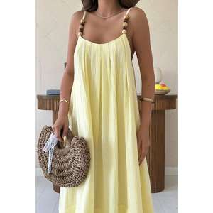 فستان موسلين أصفر بحمالات مقاس واحد للبيع بالجملة، بتصميم محتشم على الطراز الأفريقي/الأوروبي/الأمريكي، سادة وطويل يصل للأرض، مناسب للمناسبات النهارية والحفلات، مخيط. - Product Image 2
