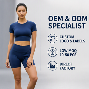 Ensemble de yoga sans couture bleu marine premium avec haut court ajusté à manches courtes et mini-short sculptant taille haute pour l'entraînement physique - Product Image 1