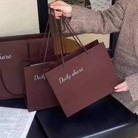 Sacs en papier brun imprimés au détail personnalisés de luxe avec logo personnalisé pour vêtement