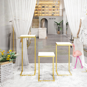 Sáng Tạo Nano Vàng Đảo Cho Showcase Tủ Cao-Thấp Bảng Hiển Thị Giá Cho Giày Túi Quần Áo Trong Cửa Hàng Quần Áo - Product Image 1