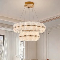 Luminaire suspendu en acrylique et acier inoxydable de luxe, modèle 2026 de Madong Lighting, lampe de salle à manger moderne haut de gamme, unique