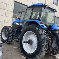 Tracteur à quatre roues motrices New Holland TM175 d'occasion avec 175 chevaux, adapté aux équipements agricoles lourds