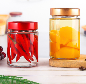 Vente en gros de petits <span class=keywords><strong>pots</strong></span> ronds de stockage de <span class=keywords><strong>confiture</strong></span> en verre 100ml-500ml <span class=keywords><strong>pots</strong></span> en verre alimentaire en verre avec couvercle de couleur personnalisé étiquette OEM - Product Image 1