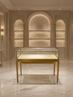 Vitrine de présentation de bijoux en acier inoxydable sur mesure avec verre haute transparence et éclairage LED pour les magasins de détail