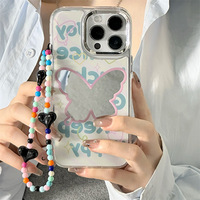 Coque de téléphone portable anti-chute en TPU/PC avec chaîne, motifs de dessins animés mignons et féminins, designs de luxe, vente en gros