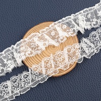 Tissu en dentelle plissée de luxe très demandé pour robe de mariée, lingerie, bordure en dentelle élastique brodée tricotée chaîne en stock