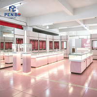 Vitrine de présentation de bijoux de luxe élégante pour comptoir, îlot verrouillable en verre pour l'aménagement intérieur de bijouterie