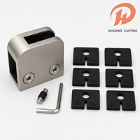 Pince de fixation pour balustrade en verre avec inserts pour systèmes de main courantes