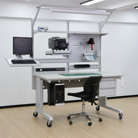 Table d'assemblage ESD réglable conçue pour la fabrication électronique avec un cadre en acier robuste pour un fonctionnement stable OEM