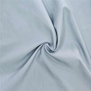 Precio <span class=keywords><strong>de</strong></span> fábrica Chaqueta a prueba <span class=keywords><strong>de</strong></span> viento Tela 20D Ripstop 45% Nylon 55% Poliéster Tejido Technics para niños y niñas Prendas - Product Image 4