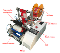 Étiqueteuse à rouleaux Étiqueteuse à rouleaux, l'étiqueteuse manuelle de bouteilles SEMI AUTOMATIQUE peut ajouter le code d'impression