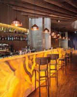 Prix usine design luxe dalle d'onyx jaune naturel panneau transparent pour mur de fond de comptoir de bar
