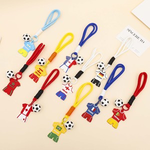 Porte-clés en silicone PVC style maillot de football 2026 avec motif de dessin animé pour sac à dos et accessoires de voiture - Product Image 1