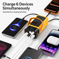 Batterie externe solaire 30000mAh 22.5W à charge rapide avec câbles 4-en-1 intégrés et lampe torche LED pour le camping et les voyages