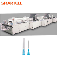 Machine de fabrication et d'assemblage d'aiguilles pour seringues hypodermiques à usage médical
