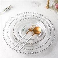 Assiette de service en verre transparent avec bordure dorée perlée pour la restauration, les banquets, les hôtels et la décoration des complexes hôteliers