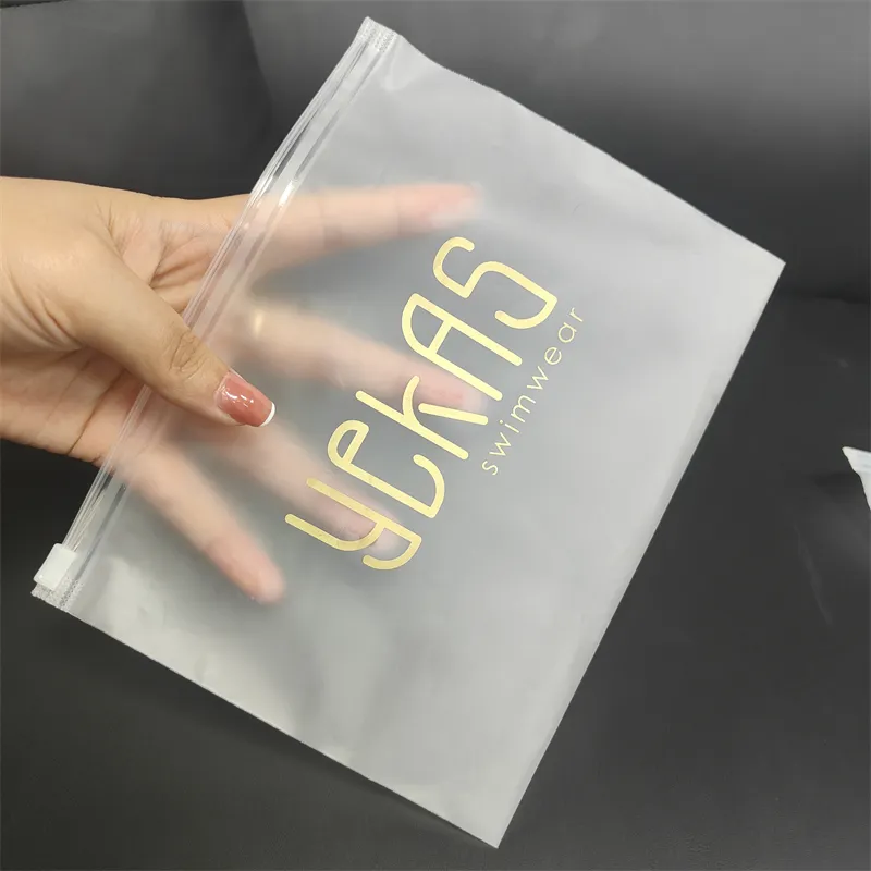 Vente en gros de sacs à vêtements avec logo personnalisé de 160/200 microns Emballage à fermeture éclair auto-scellant en plastique givré transparent finition mate