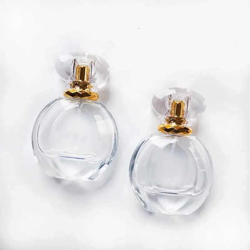 H & Z卸売カスタムメイドクリアアート刻まれたクリスタル空の詰め替え可能な香水瓶50ML