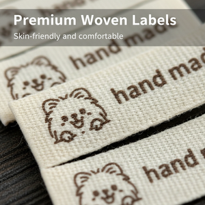 Eco-friendly fabric <b>labels</b> for garment manufacturing and <b>name</b> tags; rectangular in shape; screen-printed suitable for clothing - Product Image 1