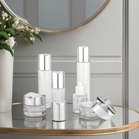 Ensemble de flacons cylindriques en verre de luxe 35ml 100ml 120ml, pots 30g avec couvercle, pompe pulvérisatrice, crème de soin, diffuseur, sérigraphie, emballage