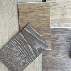 Planche de revêtement de sol en vinyle SPC personnalisée OEM, grain de pierre, imperméable, résistante à l'usure, panneau de décoration pour bâtiment - Product Image 1