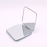 Miroir de maquillage de voyage double face avec mini poche compacte et pliable grossissant