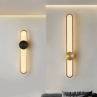 Applique murale design en métal et silicone avec lumière LED pour chambre à coucher, salon ou salle de bain