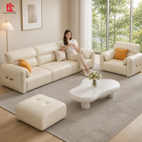 Canapé en cuir pleine fleur de style italien minimaliste, moderne et épuré, couleur crème, luxe léger, modèle Oreilles d'éléphant, pour petit appartement