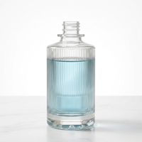 Vente en gros de flacons de parfum en verre transparent personnalisés de haute qualité, 375 ml, bouchon à vis cylindrique, design élégant, flacon à liqueur pour l'emballage