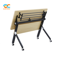 Table d'entraînement fonctionnelle avec roulettes, plateau blanc, structure noire, pliable et empilable pour salles de classe, réunions, salles de formation