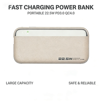 Batterie externe haute capacité 10000mAh avec charge rapide 22.5W, câble USB-C intégré et cordon pour le camping et la randonnée en plein air