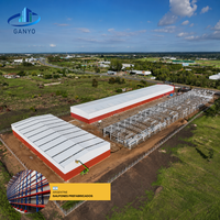Entrepôts entièrement fermés en structure métallique avec portes coulissantes pour le stockage industriel