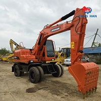 Excavatrice hydraulique d'occasion Doosan DX150W-7, 12,9 tonnes, pour travaux de construction