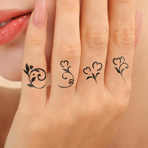 Autocollants de <span class=keywords><strong>tatouage</strong></span> temporaires de luxe pour le corps, les <span class=keywords><strong>bras</strong></span>, le maquillage, imperméables, à motif de petite fleur noire en forme d'étoile de dessin animé, vente en gros OEM - Product Image 3